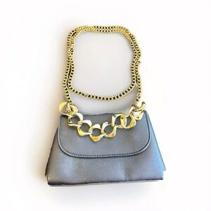 Black faux leather mini crossbody with gold tone chain detail (6.5inX3.5in)